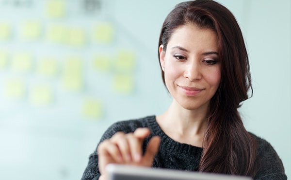 woman working on tablet