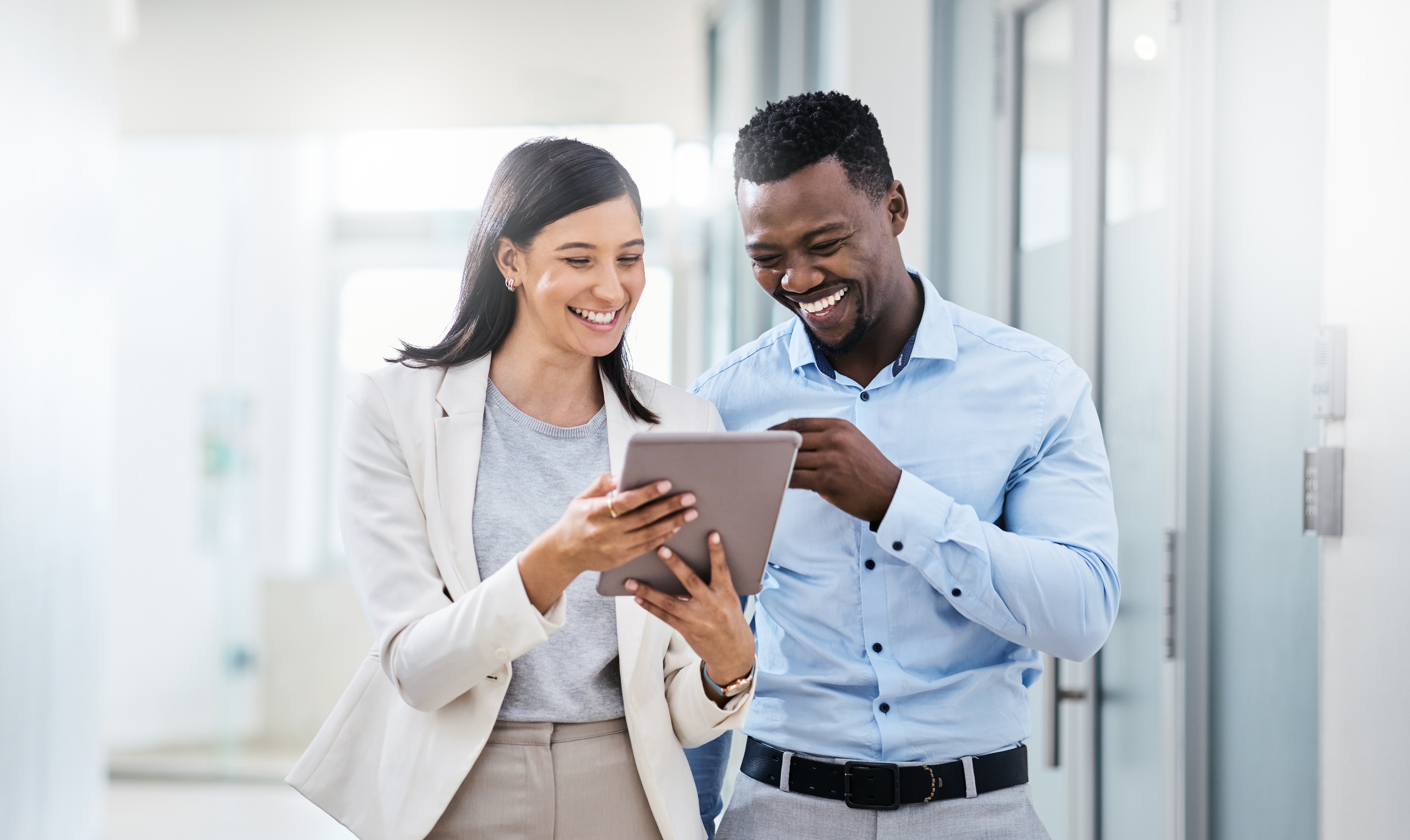 two coworkers smiling