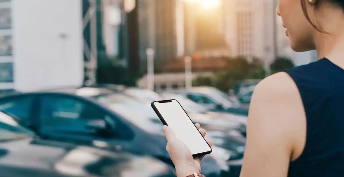 woman holding phone