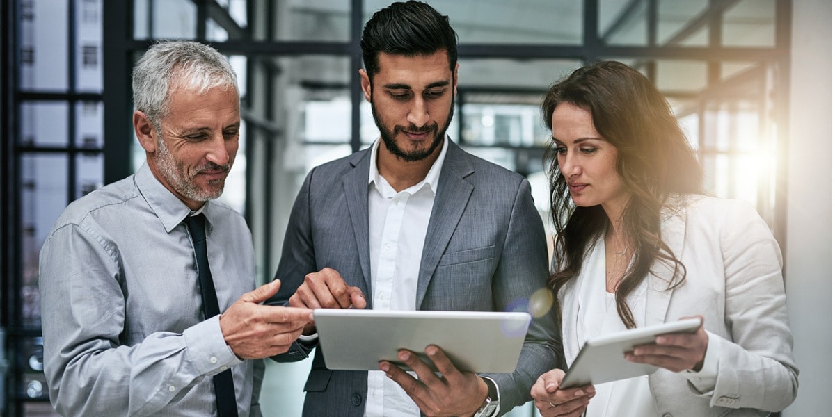 business group looking at a document