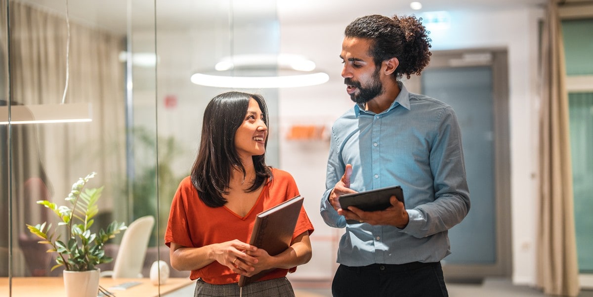 two professionals in the office