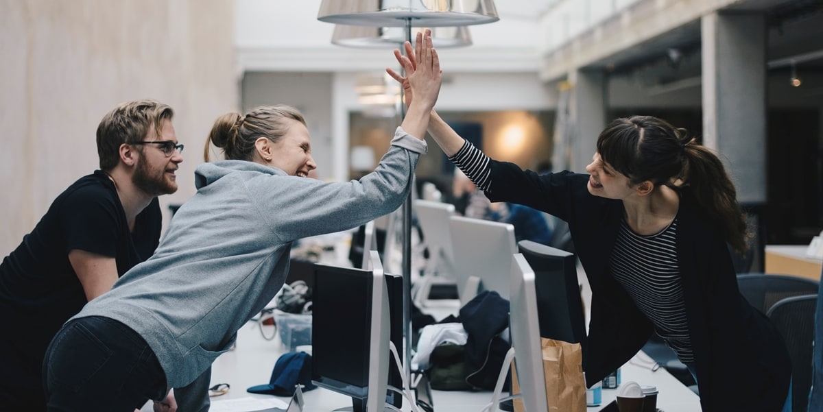 team in office, high five