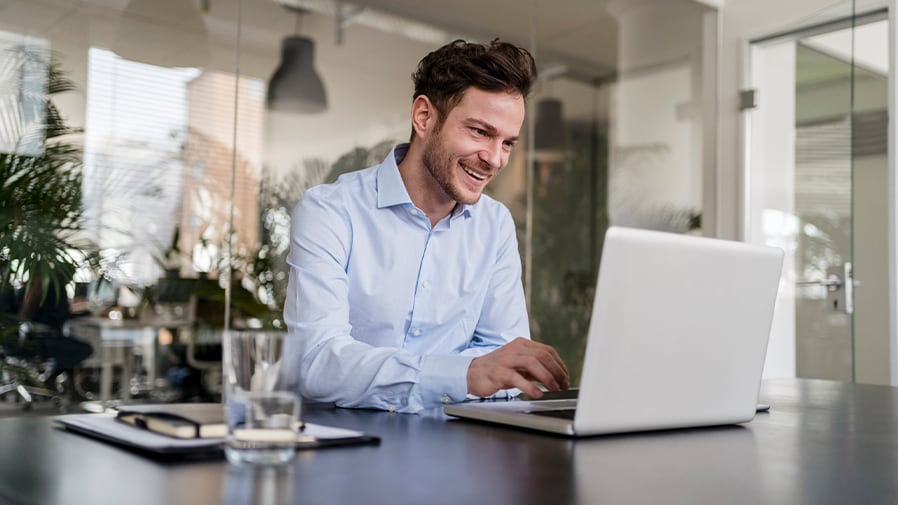 business manager on laptop