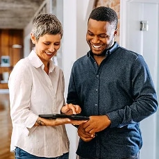 people working on a tablet